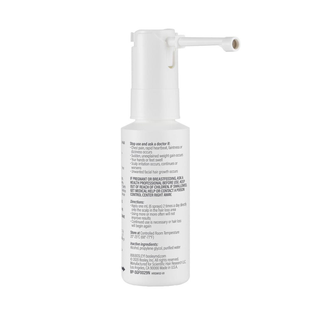 BosleyMD Minoxidil Woman Spray on dresser backdrop suggests everyday use.