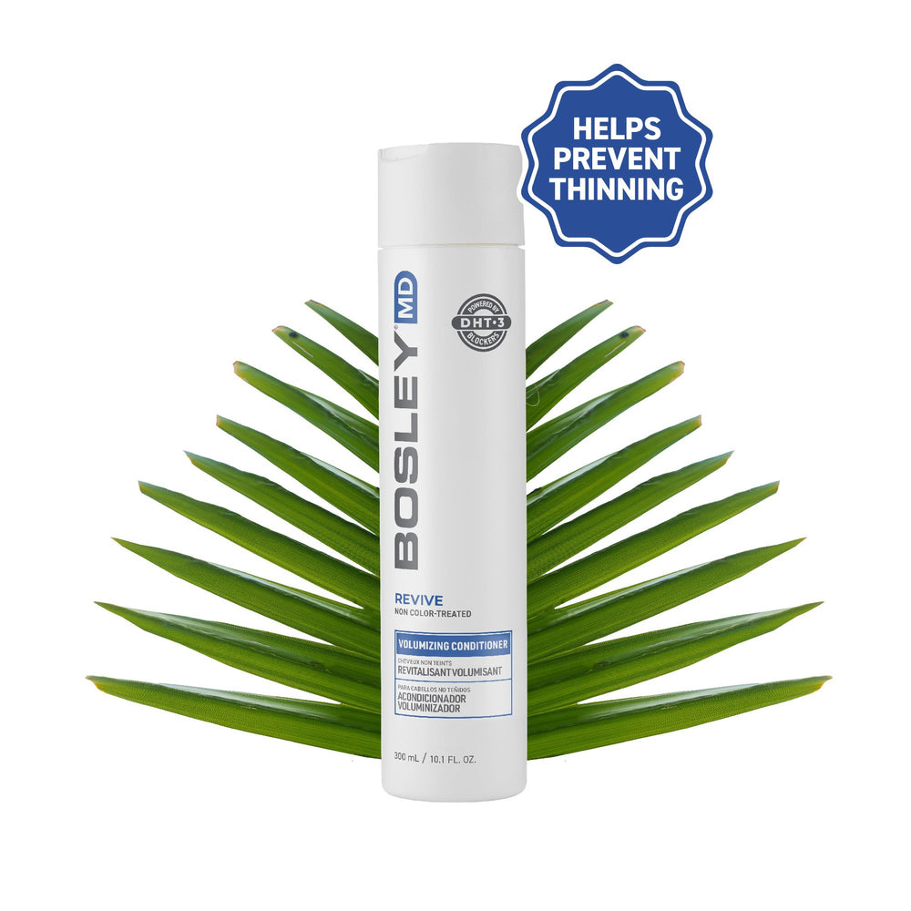 BosRevive hands applying conditioner to create soft, voluminous roots