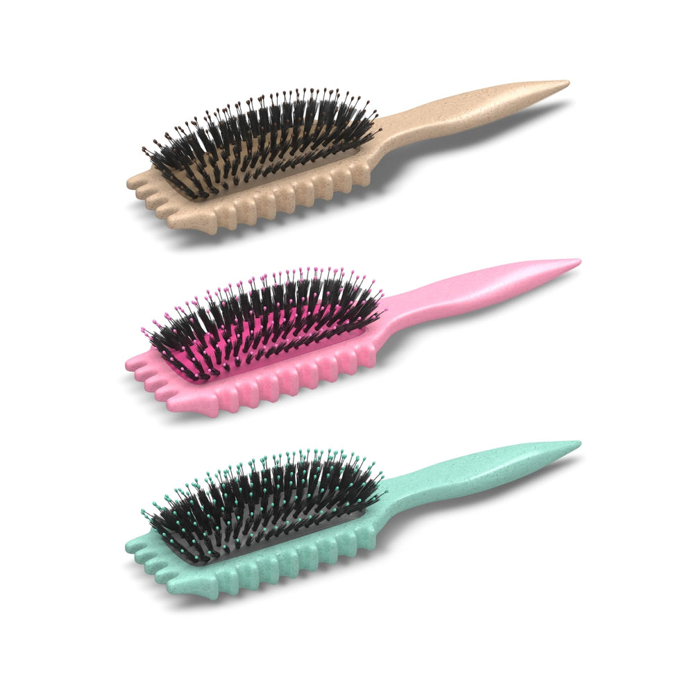 Bounce Curl Define EdgeLift Brush in use creates defined curls and waves with minimal effort.