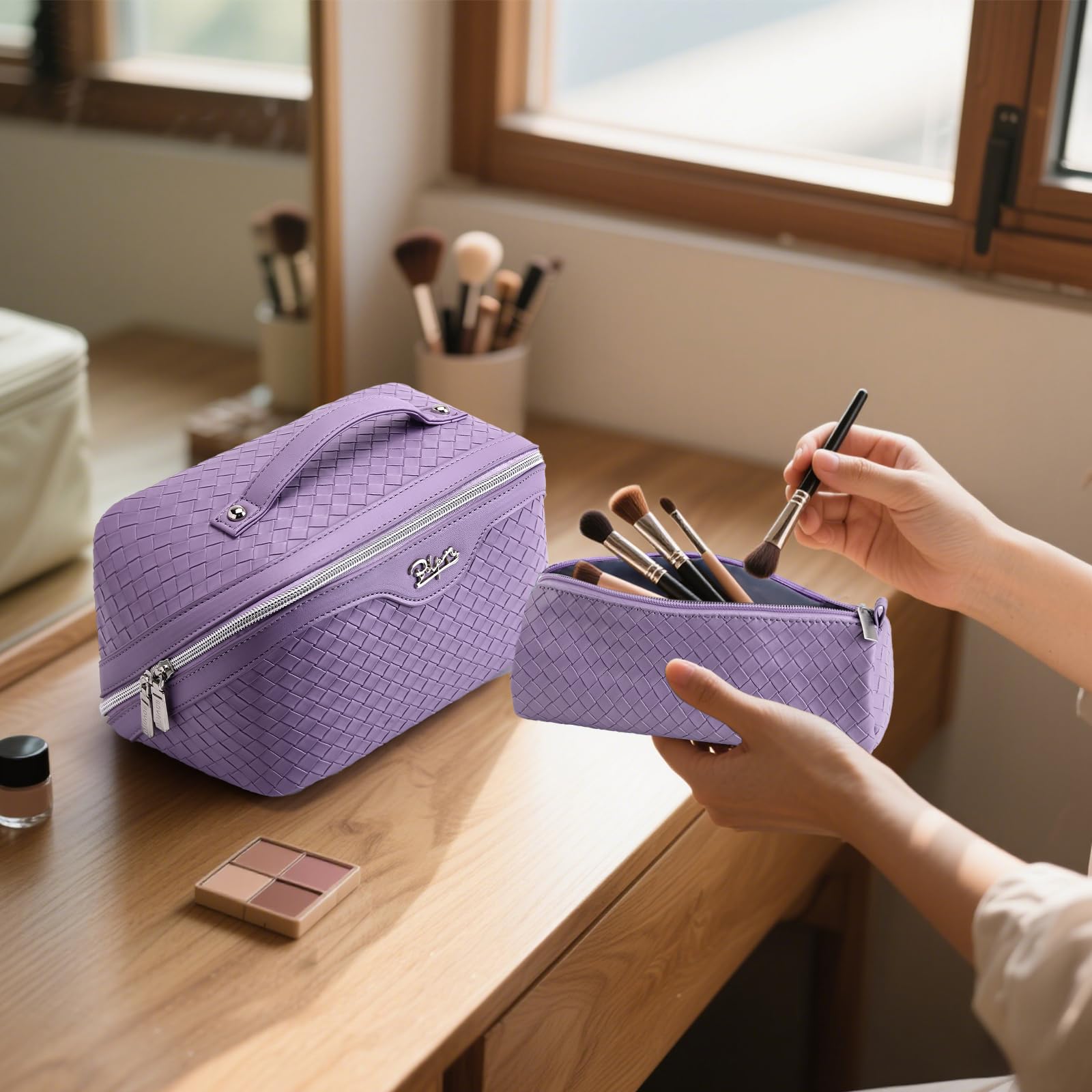 BOYATU L01 purple bag on luggage, keeps toiletries organized.