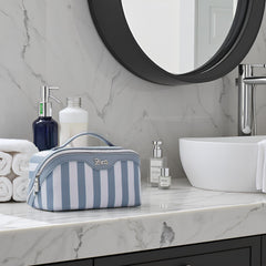 BOYATU travel makeup bag blue interior compartments organize cosmetics and skincare efficiently.