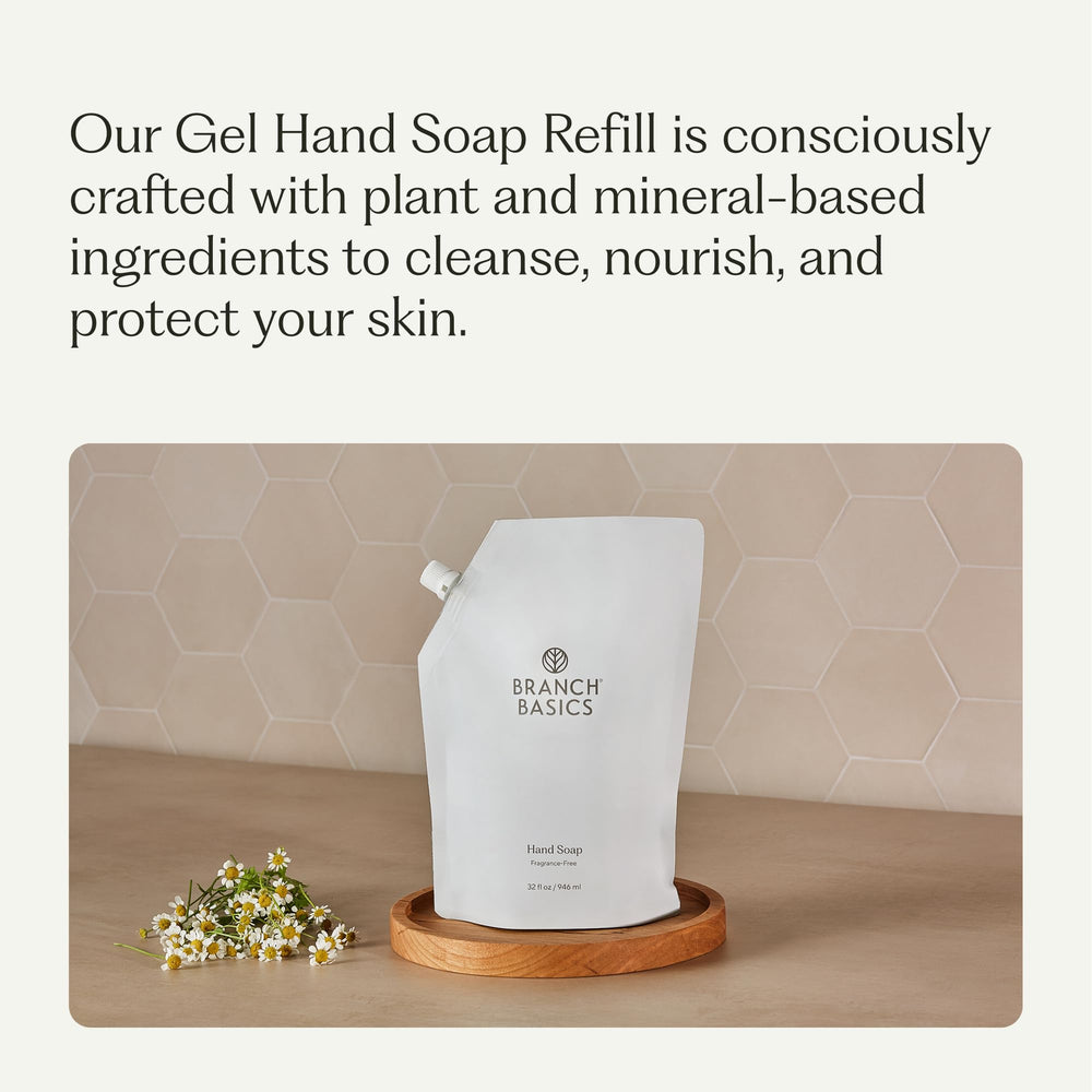 Branch Basics refill pouch pouring into bottle for mess-free, convenient hand soap refills
