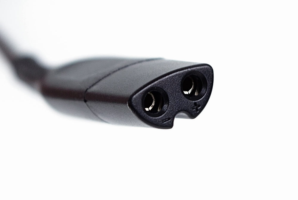 Braun wall adapter with 100–240V input suits worldwide travel.