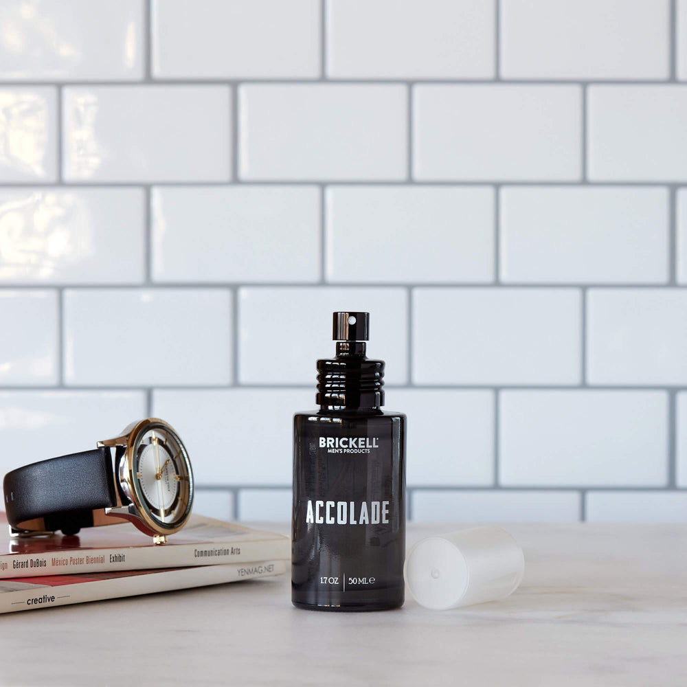 Brickell Accolade bottle on wood surface ideal for daily wear.