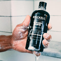 Brickell Daily Relieving Shampoo lather highlights refreshing aroma and clean rinse.