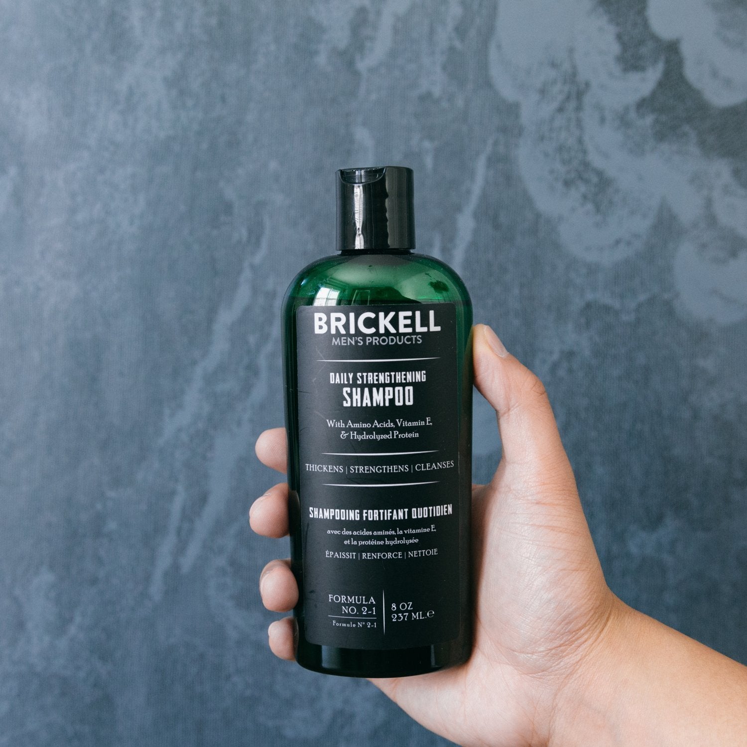Brickell Daily Strengthening Shampoo color-treated-safe label signals gentle care for dyed hair.