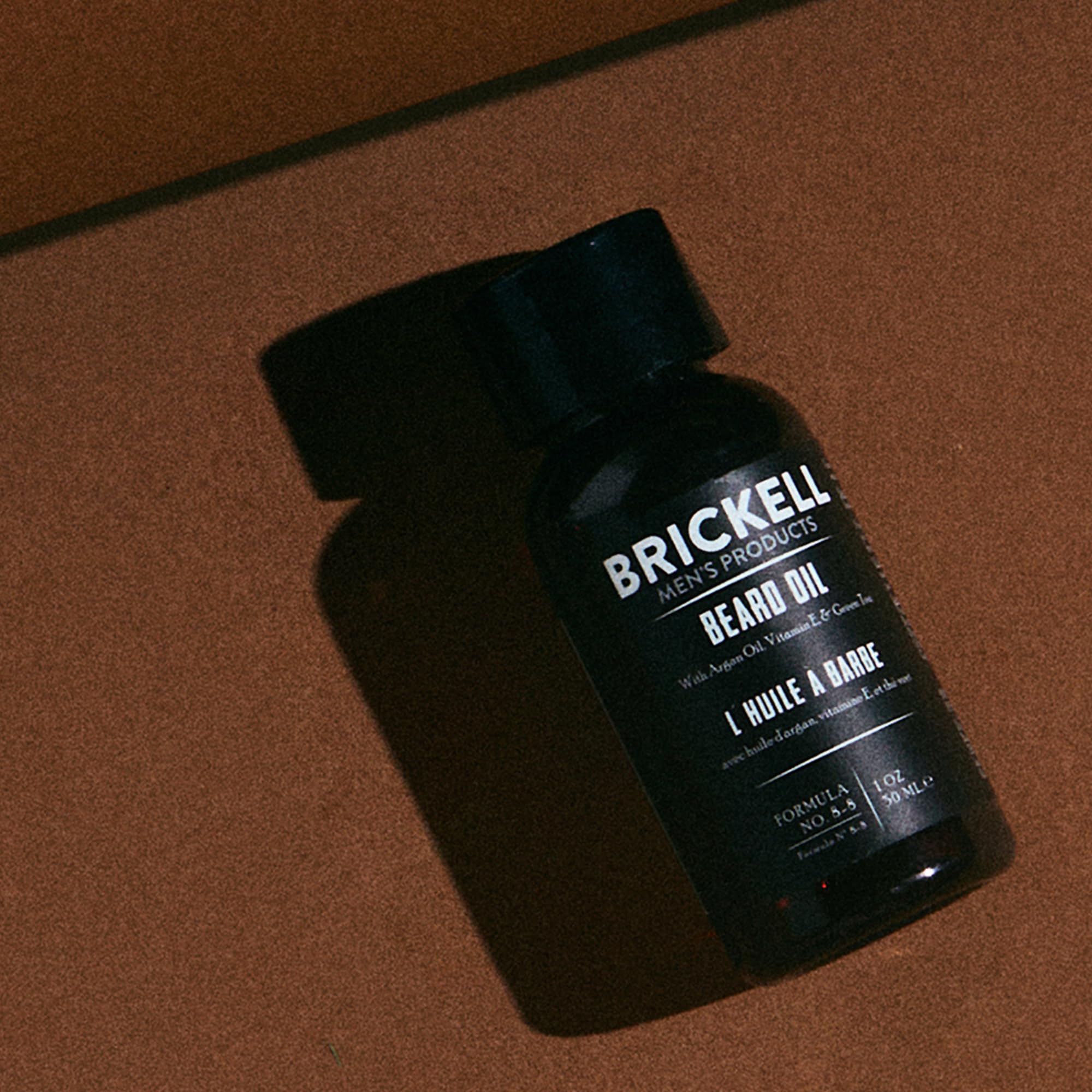 Brickell Beard Oil drops application demonstrates easy beard care.
