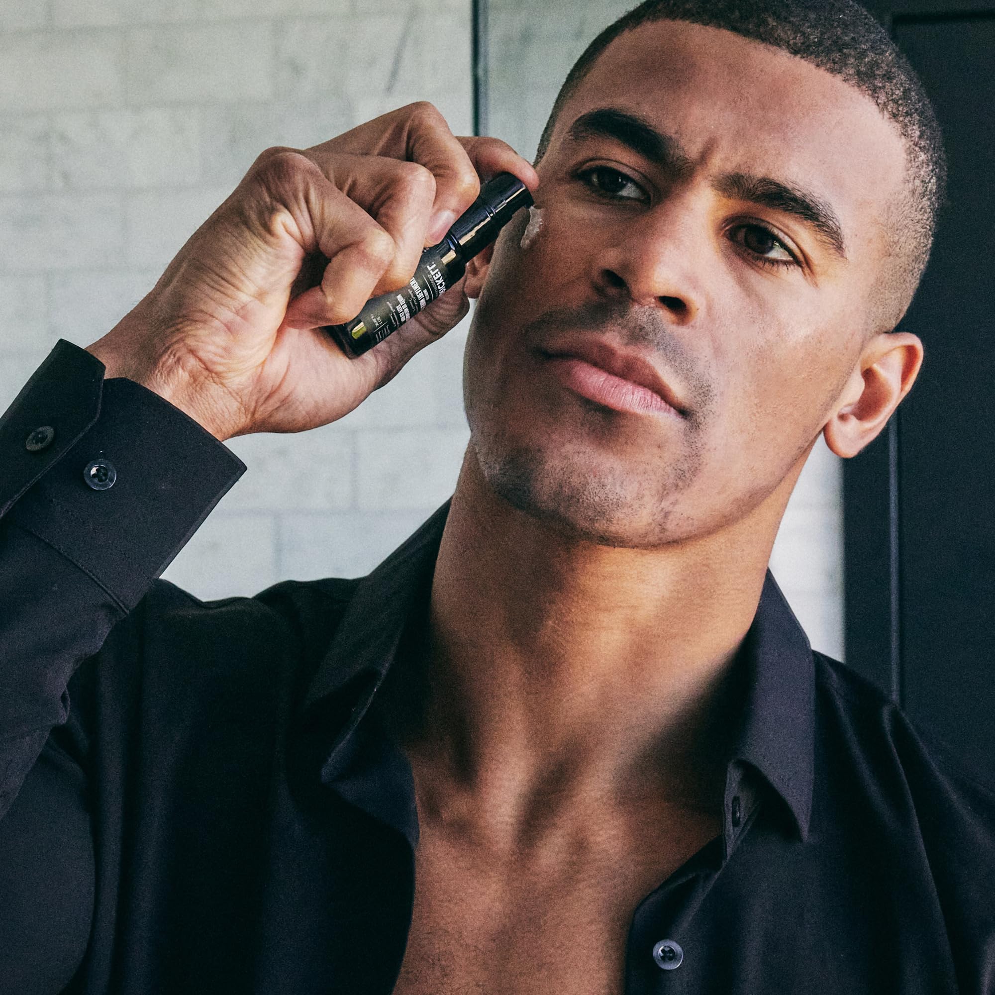 Brickell Men's Dark Circle Serum application demonstrating easy, targeted under-eye care for smoother skin.