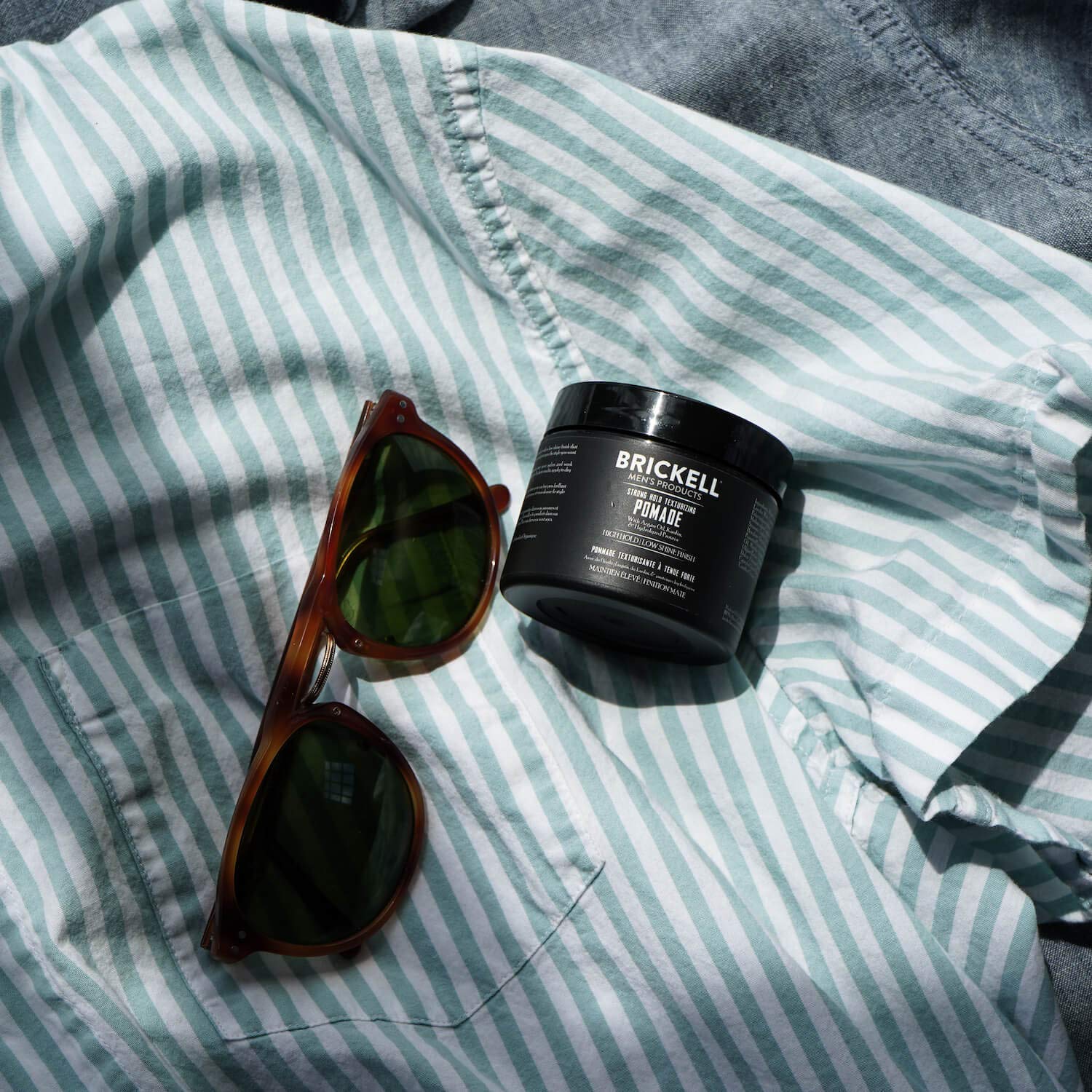 Brickell Men Products pomade packaging and label emphasizing natural ingredients.