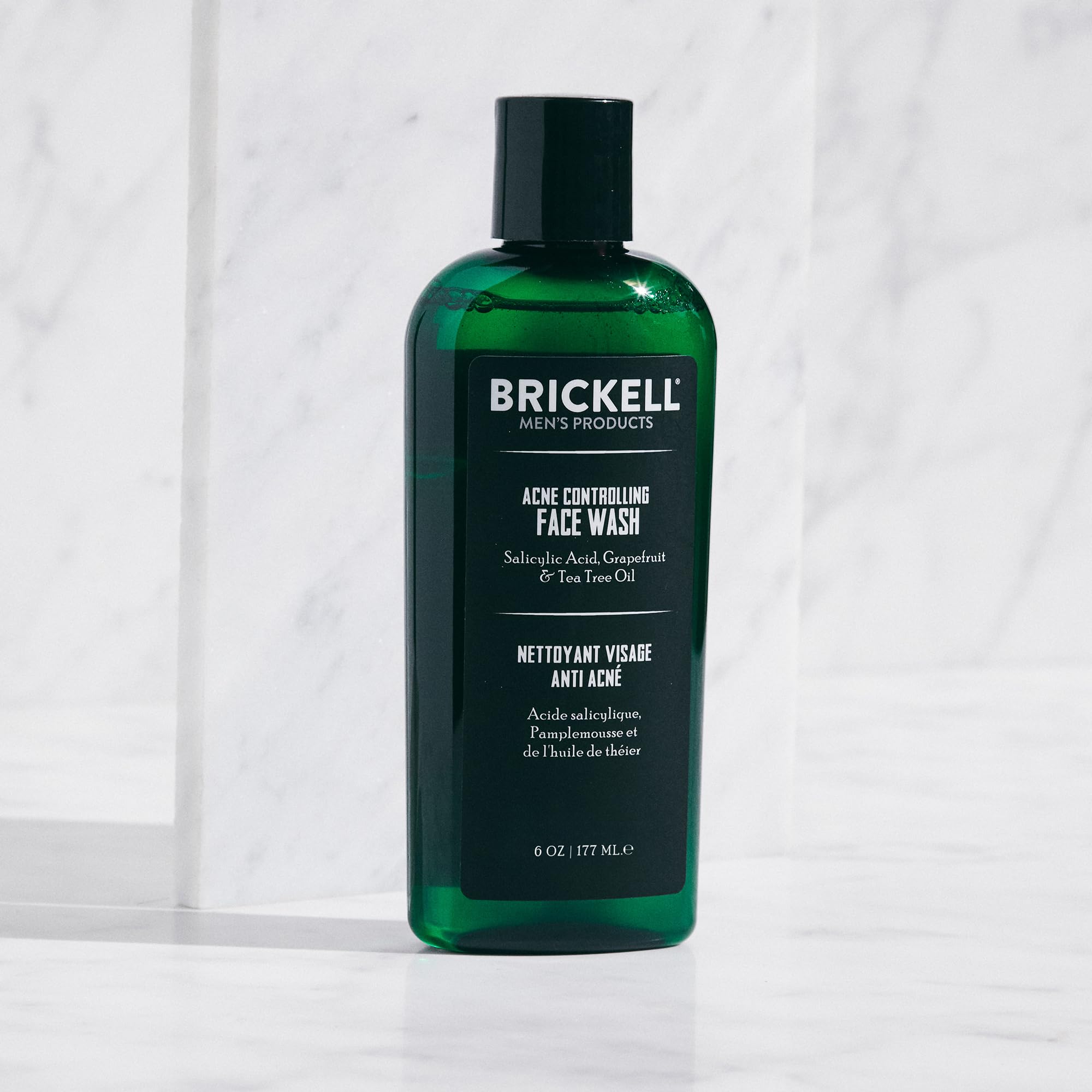 Brickell Men's Acne Face Wash closeup ingredients highlighting natural actives for clean, balanced skin