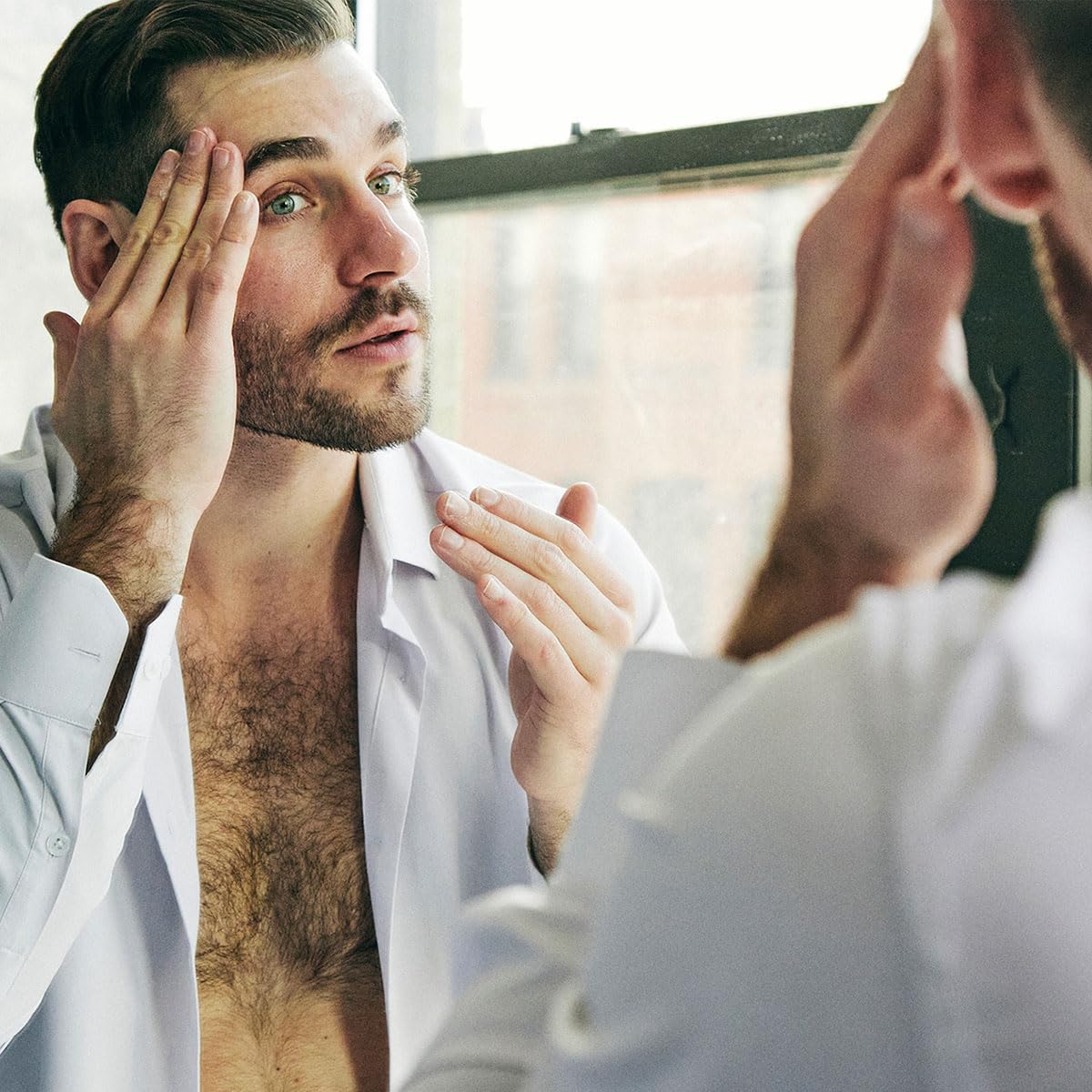 Brickell Men's Anti Aging Serum texture application demonstrates quick absorption.