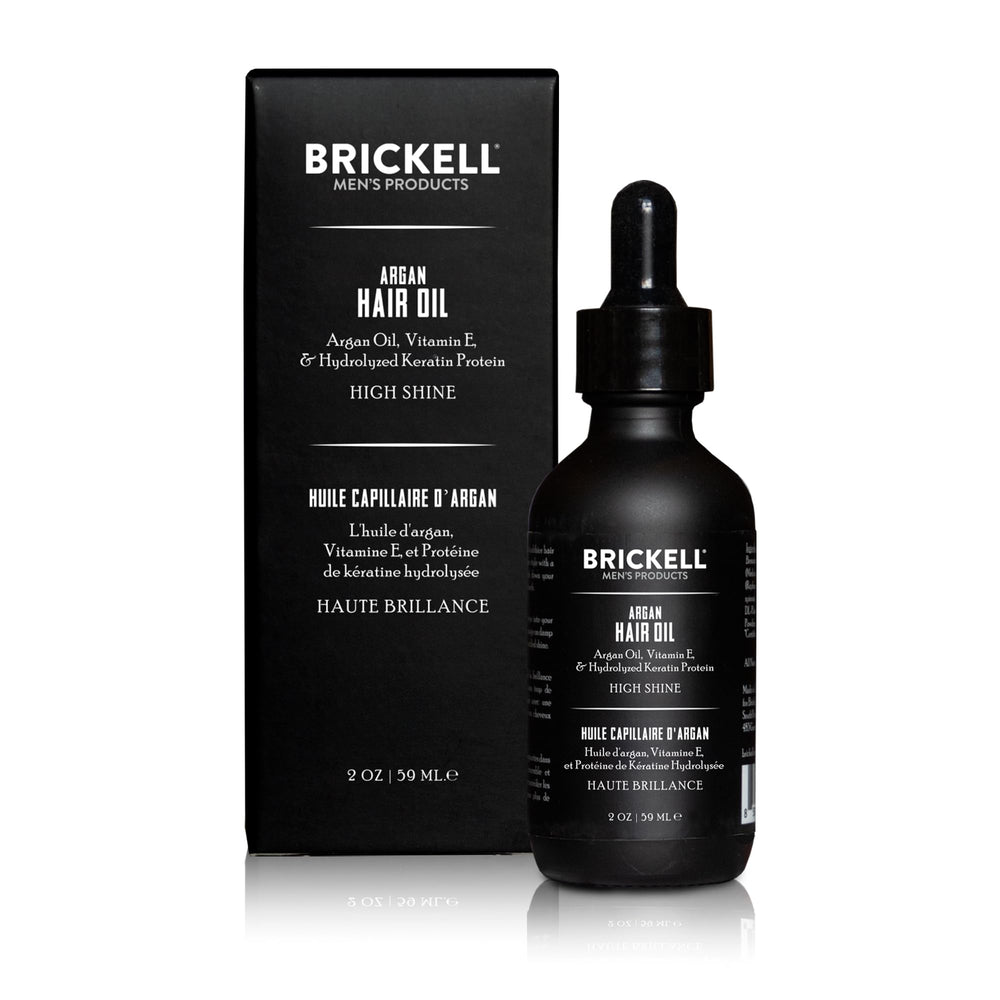 Brickell Argan Oil for Hair bottle in hand—easy daily grooming