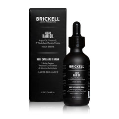 Brickell Argan Oil for Hair bottle in hand—easy daily grooming
