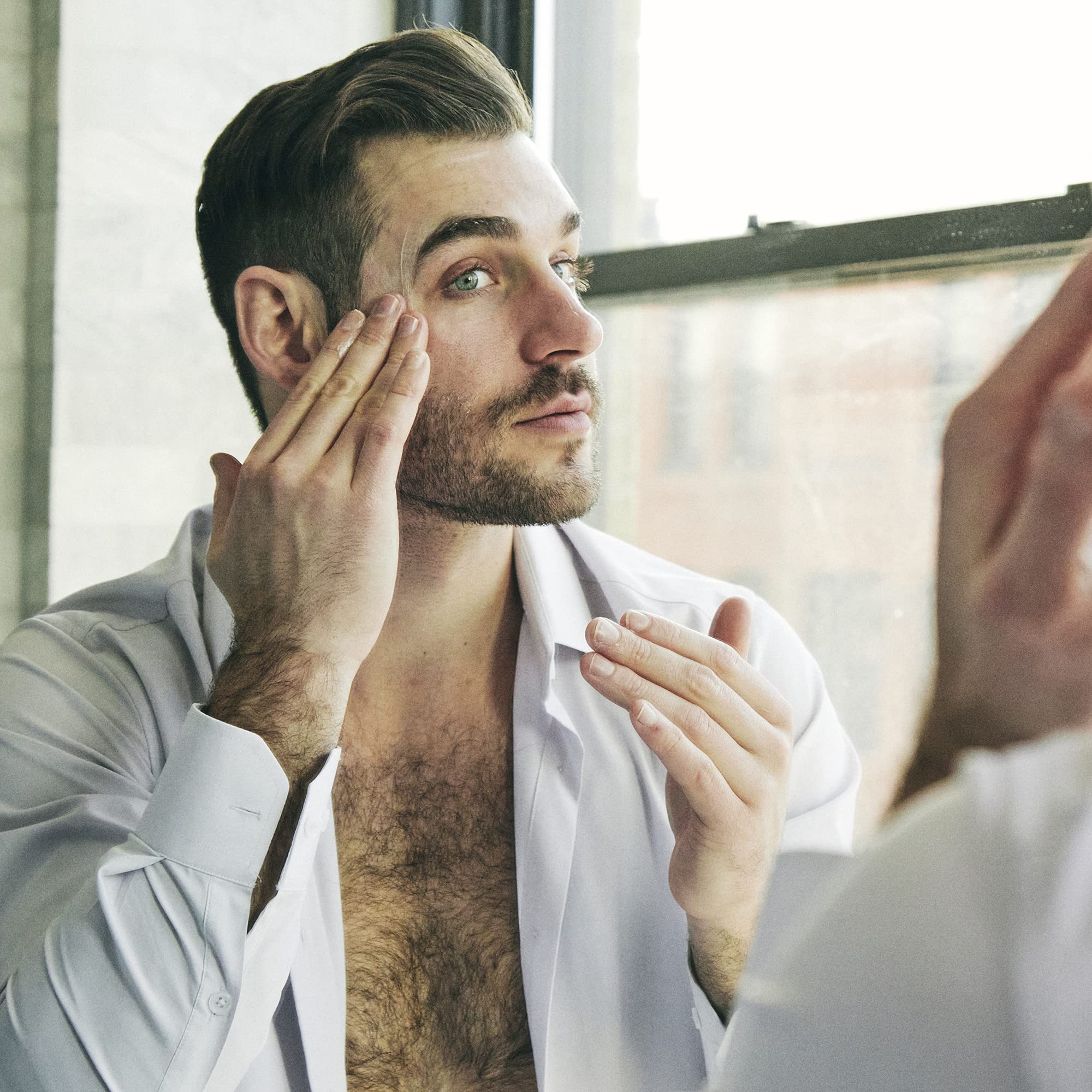 Brickell Men's Complete Defense Routine Set showing all five anti-aging products