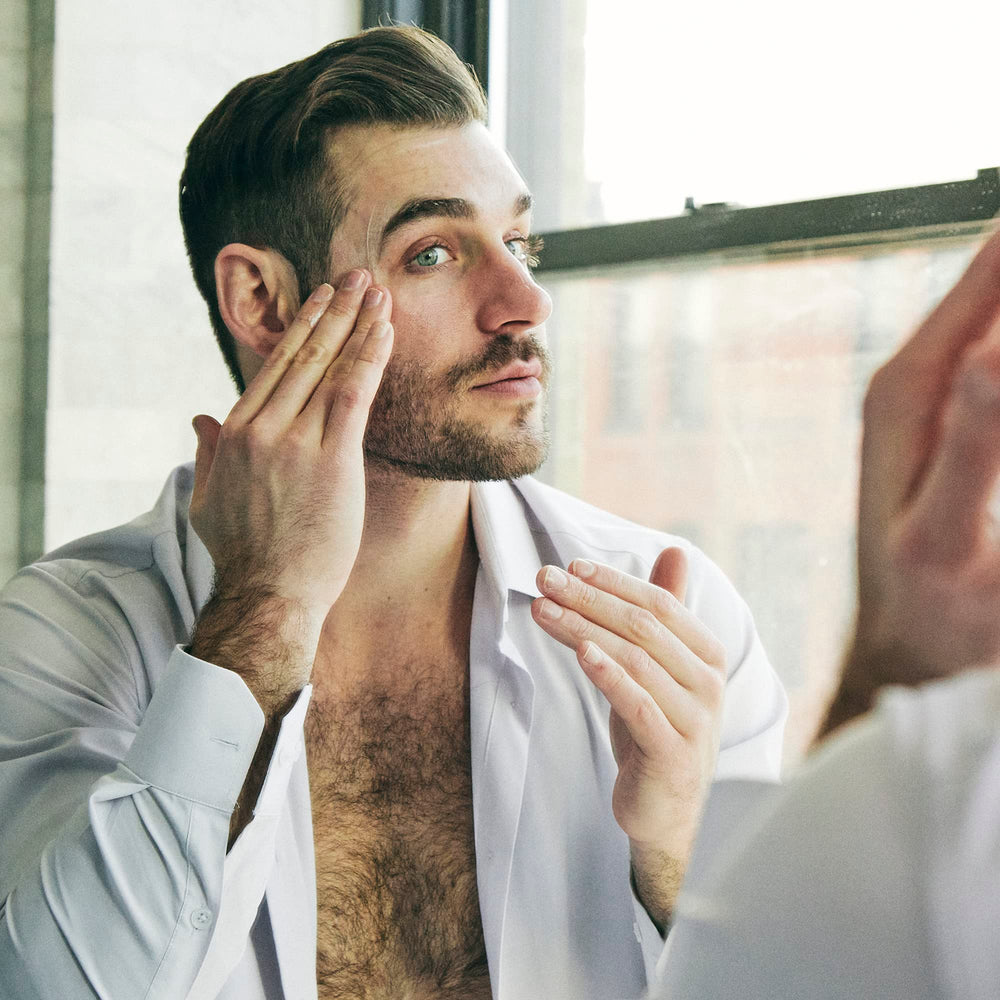 Brickell Men's Complete Defense Routine Set showing all five anti-aging products