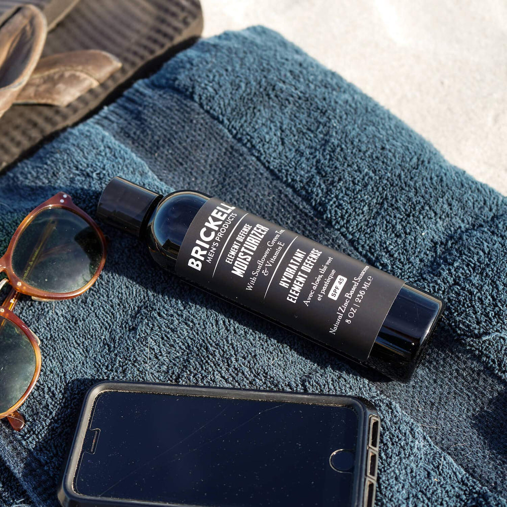 Brickell Men's Element Defense SPF45 unscented 8 oz bottle on shelf.