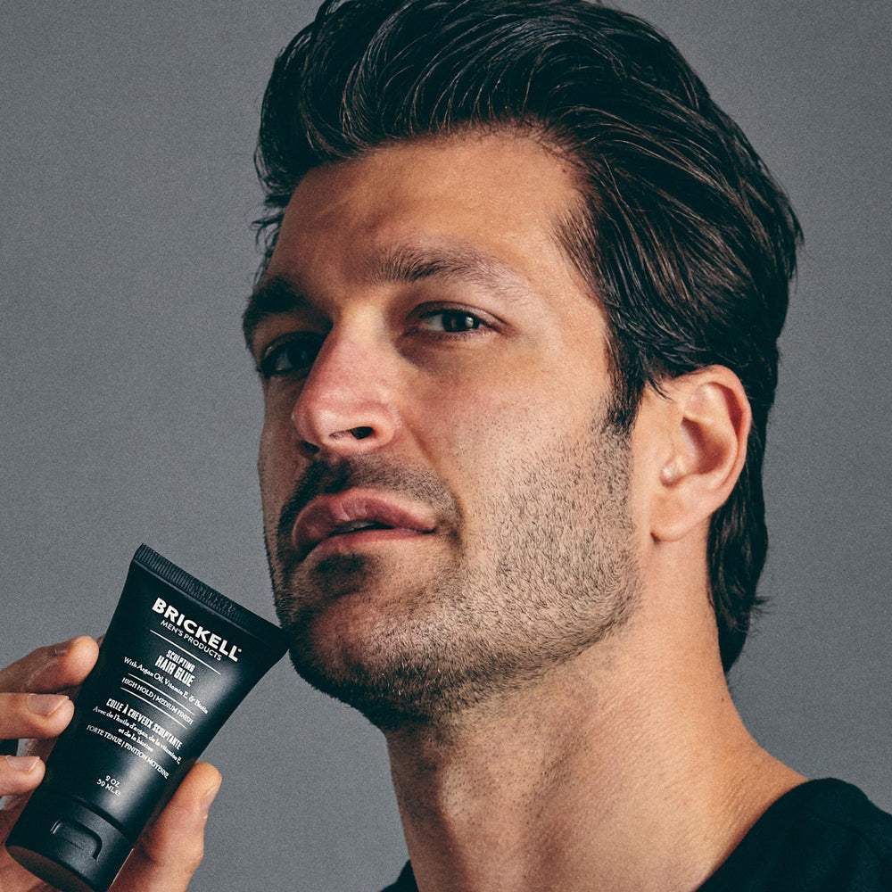 Brickell Hair Glue packaging conveys premium scented grooming experience