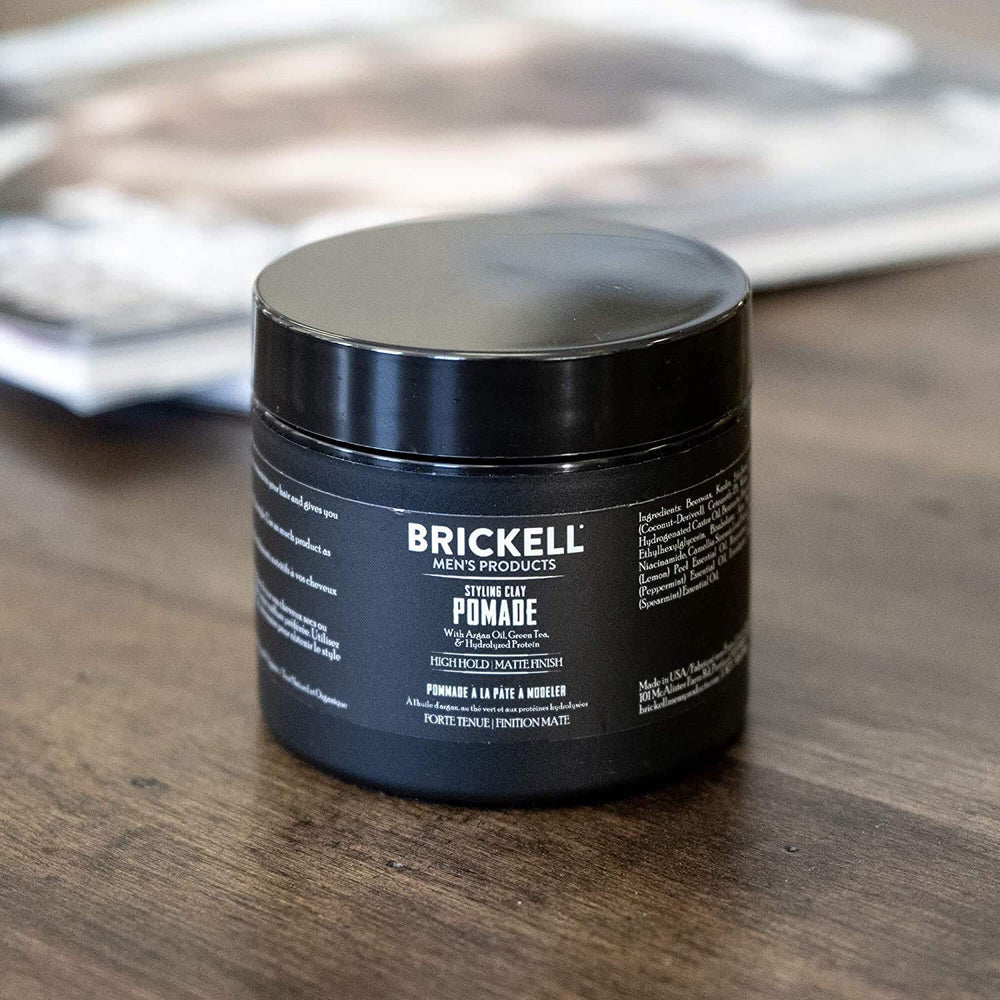 Brickell Men's Hair Styling Clay Pomade packaging highlights natural & organic formula