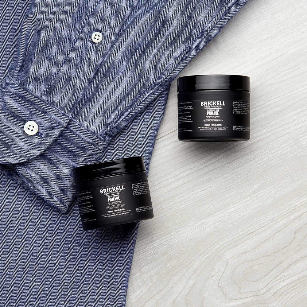 Brickell Men's Hair Styling Firm Hold Pomade packaging highlights natural ingredients and clean design.