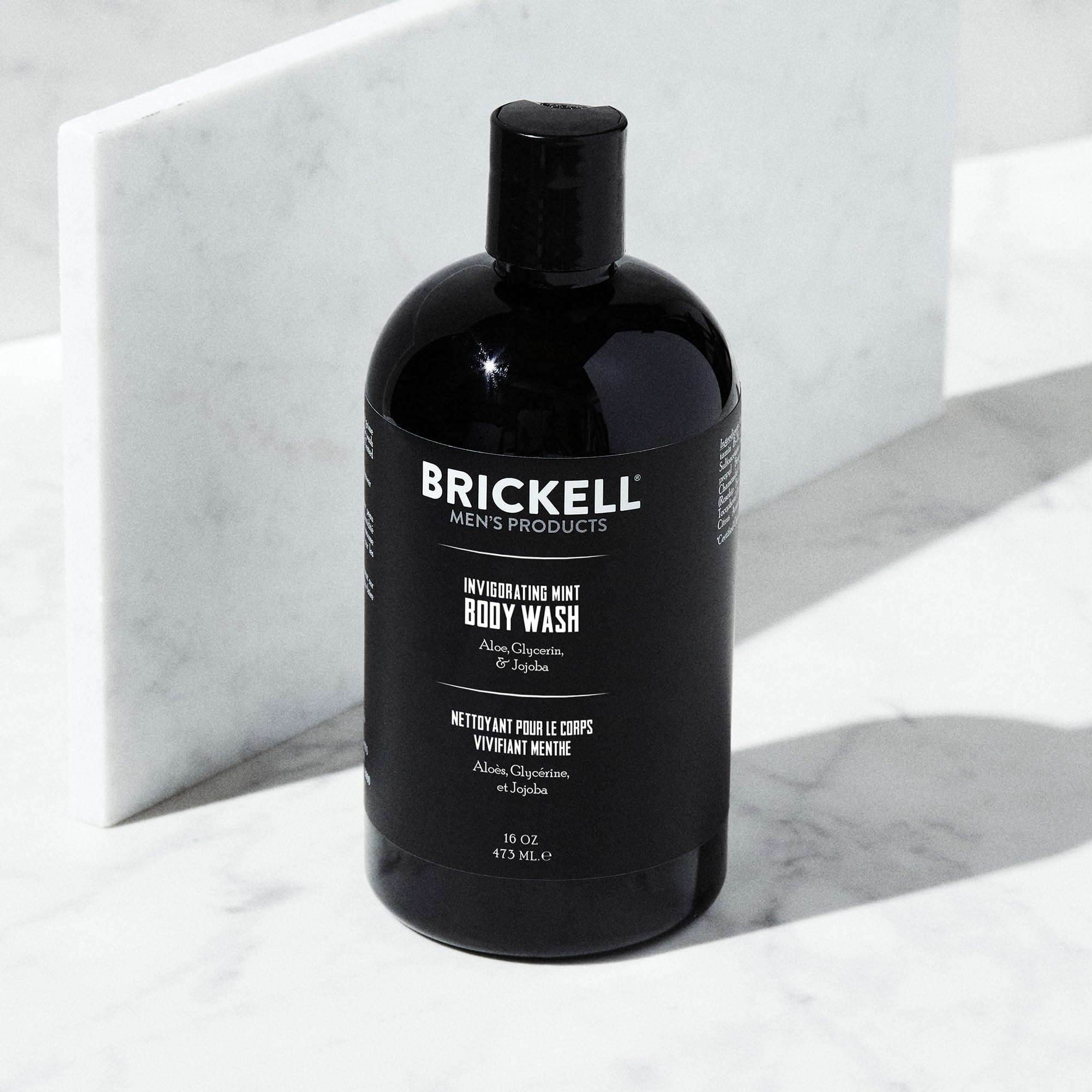 Brickell Men's Invigorating Mint Body Wash lather showing creamy foam for deep clean.