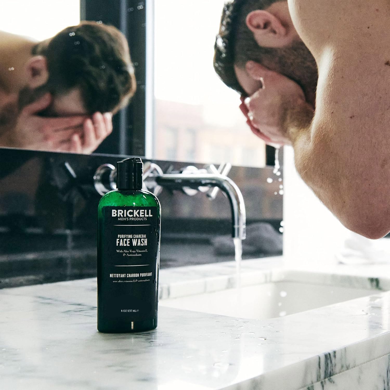 Brickell Men's Purifying Charcoal Face Wash label shows natural organic ingredients and clean energy