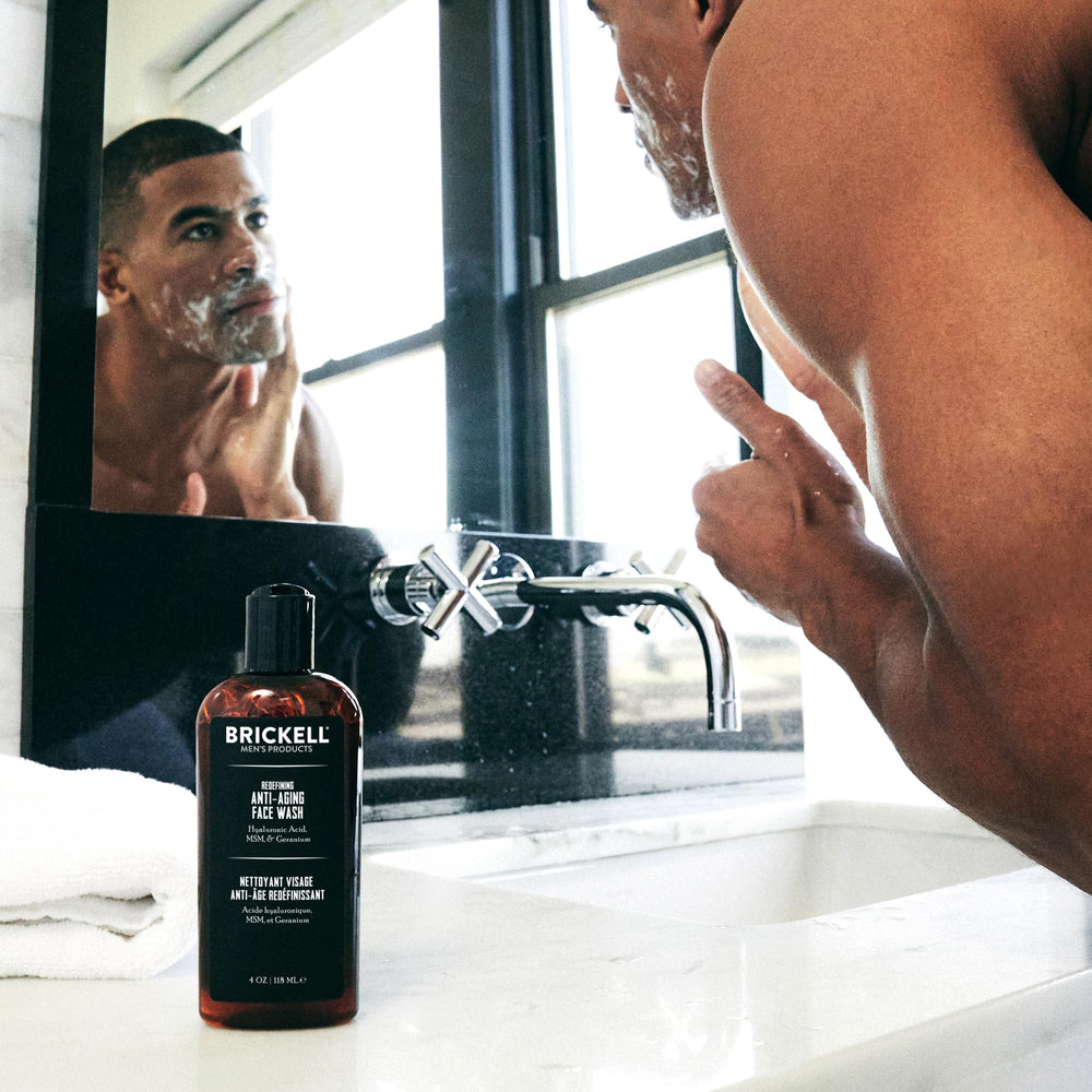 Brickell Men's Redefining Anti-Aging Face Wash face-application highlights easy routine for firmer-looking skin.