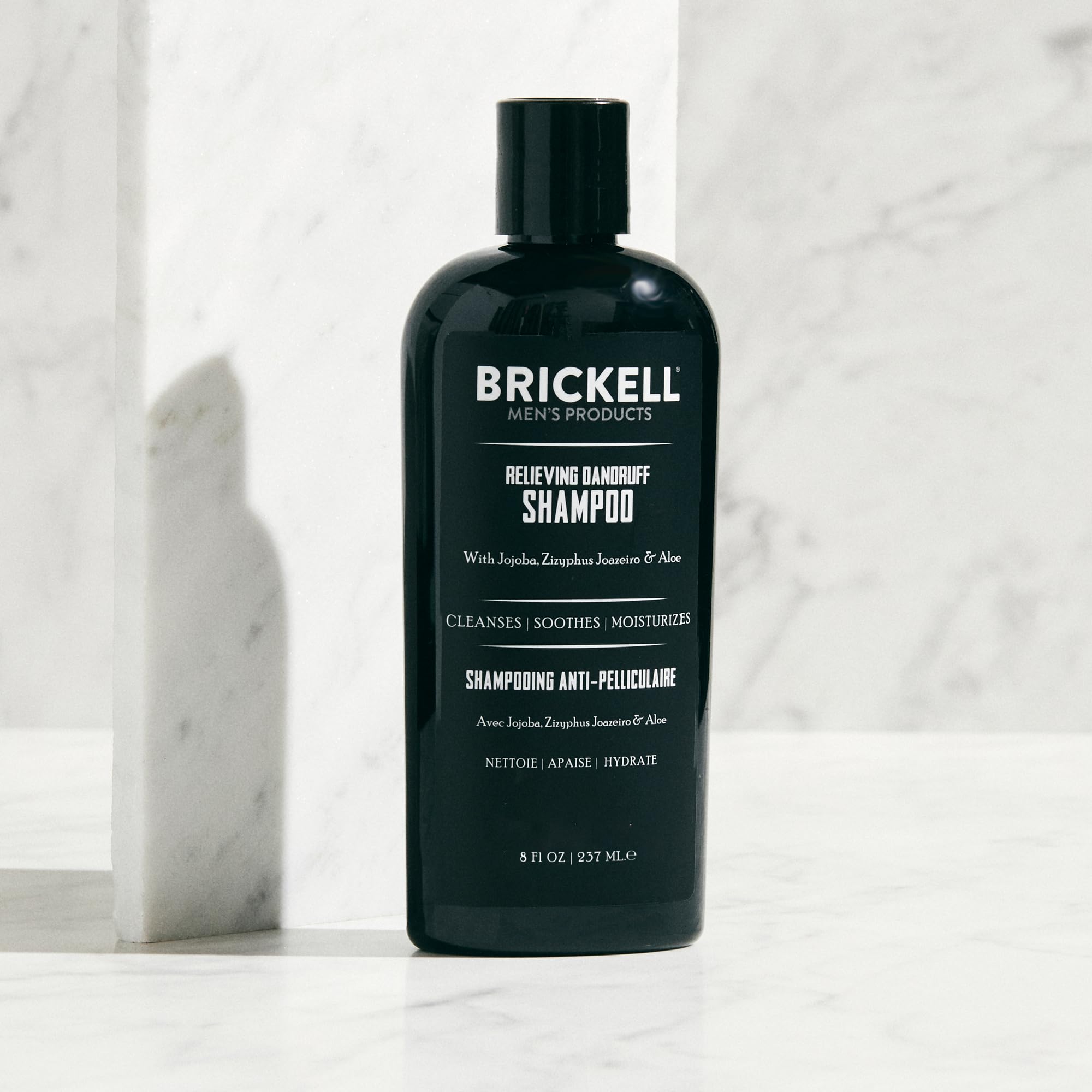 Brickell Men's Relieving Dandruff Shampoo application-hands shows an easy daily grooming routine
