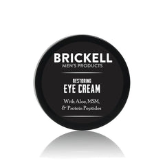 Brickell Men's Restoring Under Eye Cream tube ready for quick, unscented hydration around the eyes.