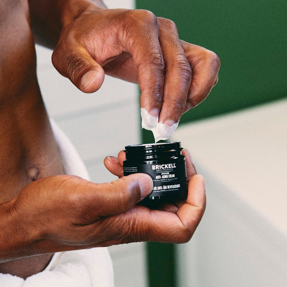 Close-up of Brickell Men's Revitalizing Anti-Aging Cream being absorbed into skin