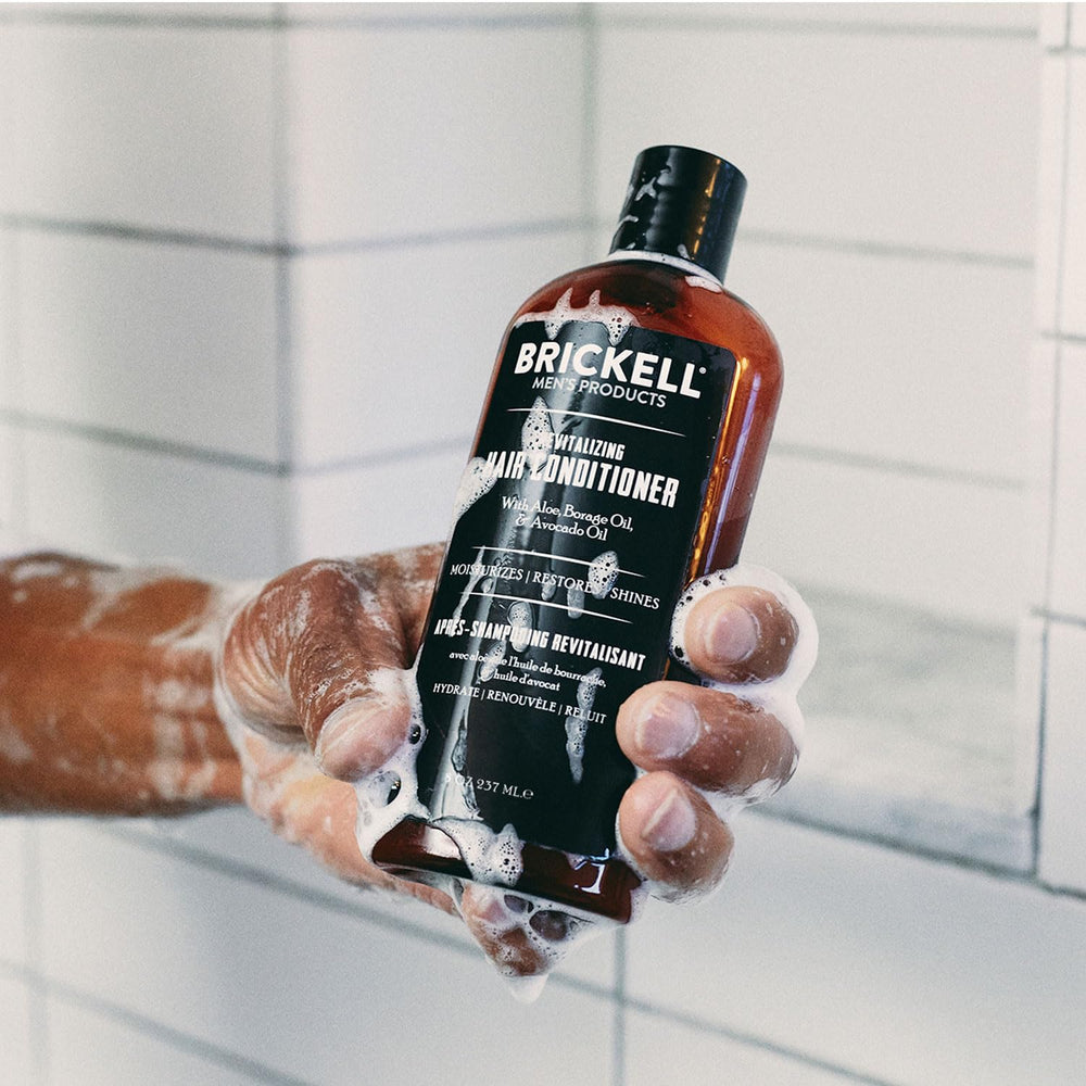 Brickell Men's Revitalizing Hair Conditioner dispense shows easy pump usage.