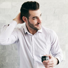 Brickell Shaping Paste Pomade ingredients close up highlights red algae and minerals.