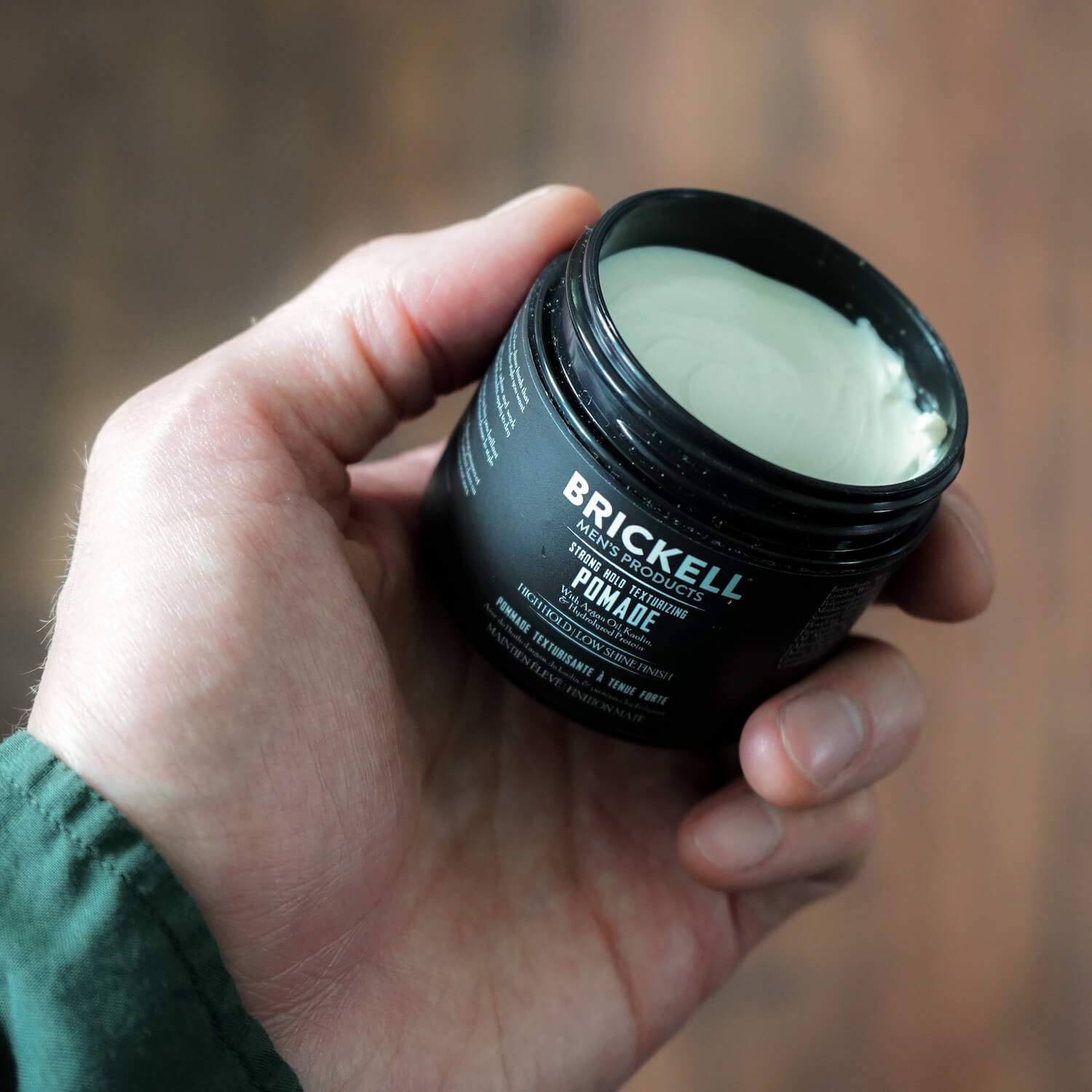 Brickell Strong Hold Pomade ingredient argan oil close-up.