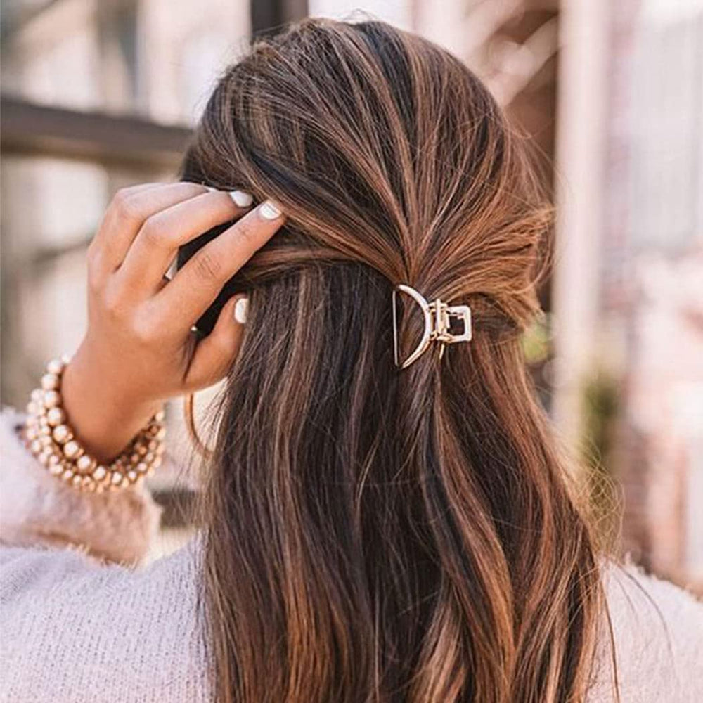 Brinie arch and square claw designs add classical charm to party hairstyles.