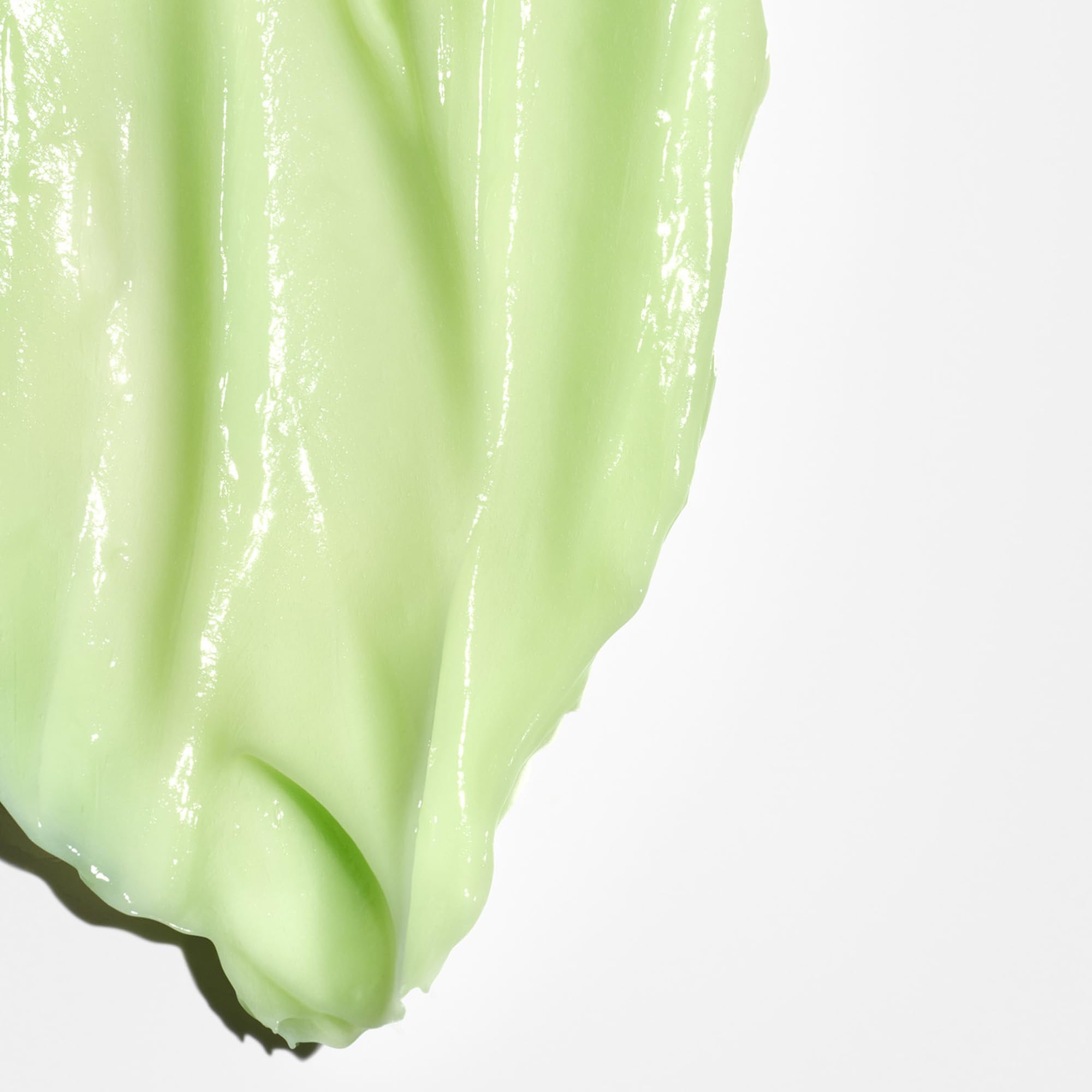 Briogeo Avocado Kiwi Mask creamy texture visible during application signals nourishment