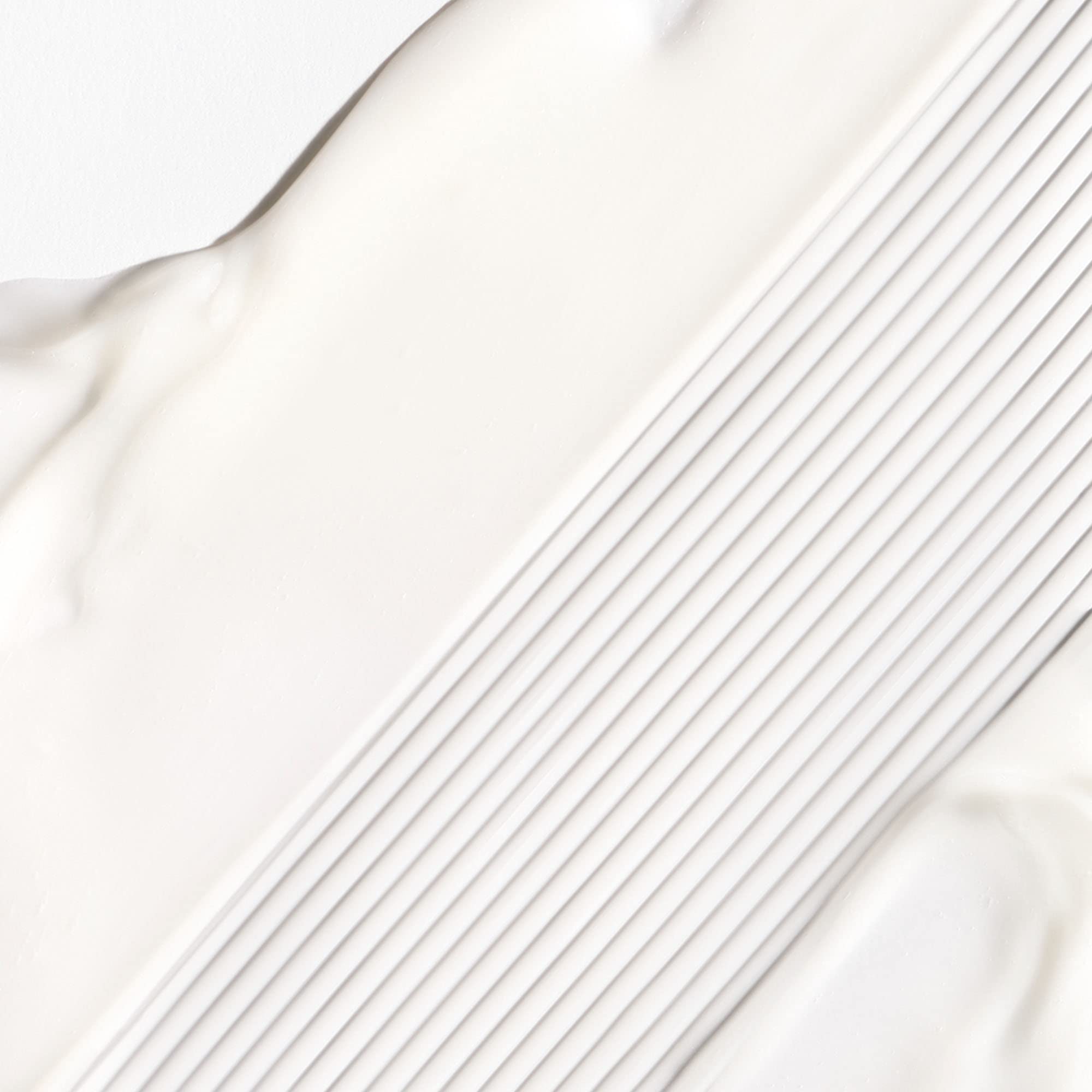 Briogeo Don't Despair, Repair! cream texture—rich moisture for dry strands.