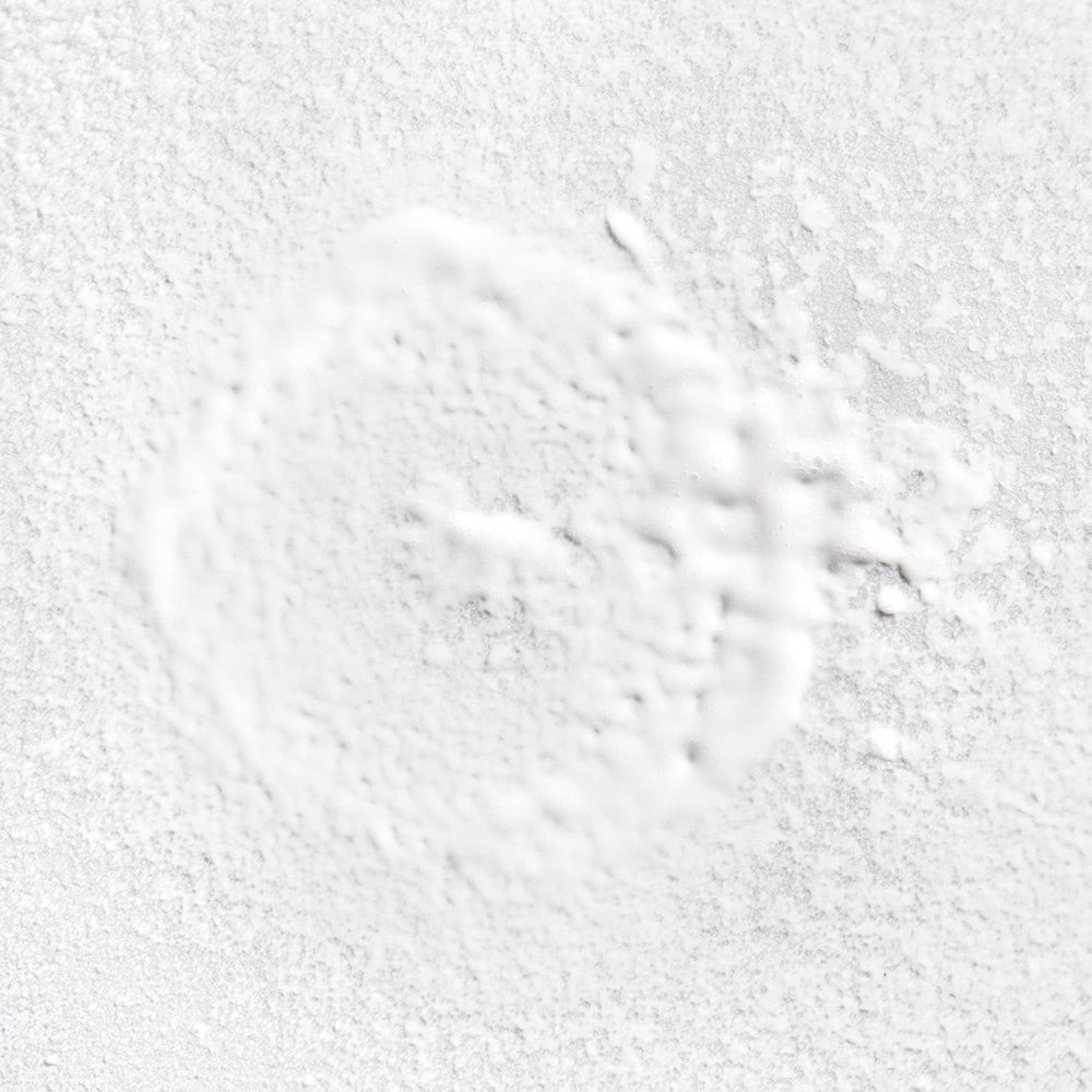Briogeo Farewell Frizz Rosarco Milk spray nozzle shown for even distribution.