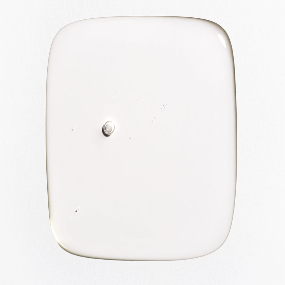 Briogeo Farewell Frizz oil applied to hair mid-lengths for smoothing