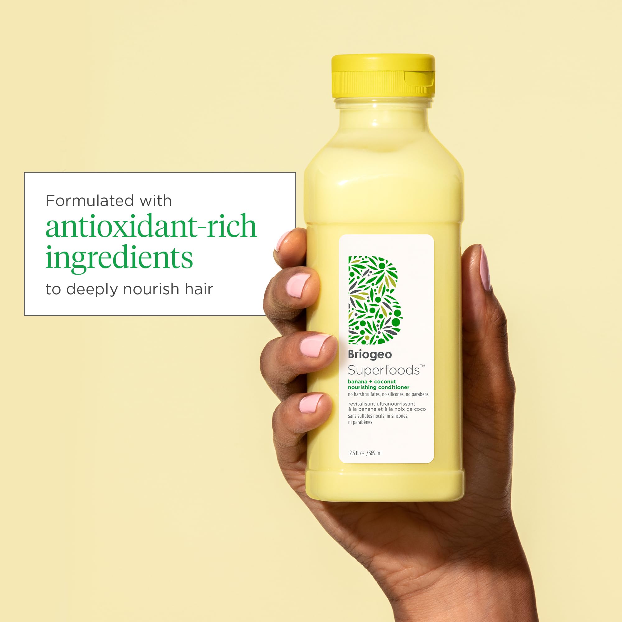 Briogeo Superfoods Banana Coconut Conditioner coconut oil close-up emphasizes moisture sealing