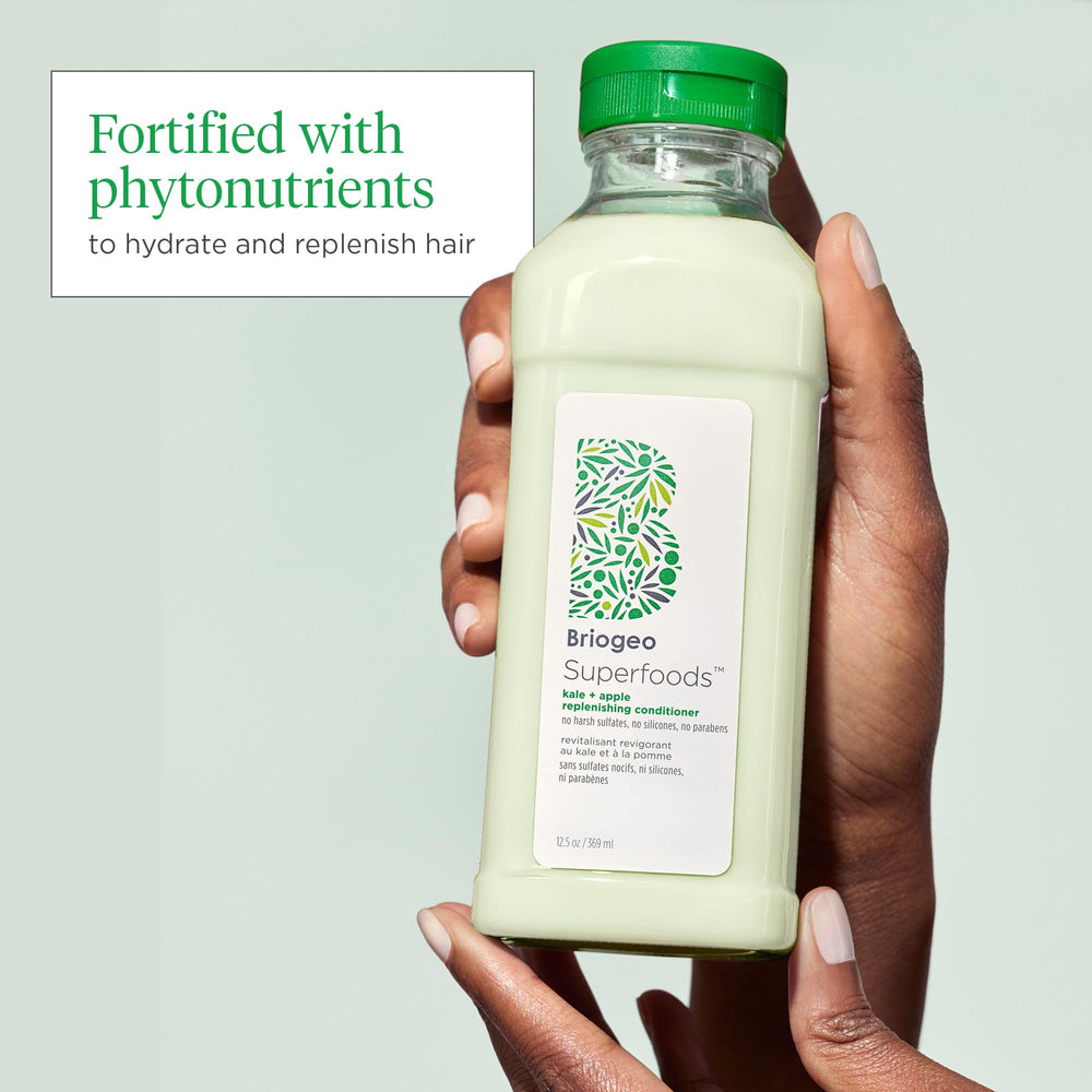 Briogeo Superfoods Kale + Apple Conditioner being applied to hair for daily moisture.