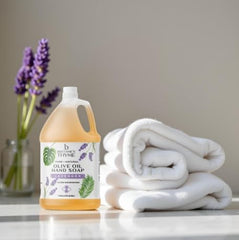 Brittanie's Thyme lavender castile soap for face and body on bathroom counter.