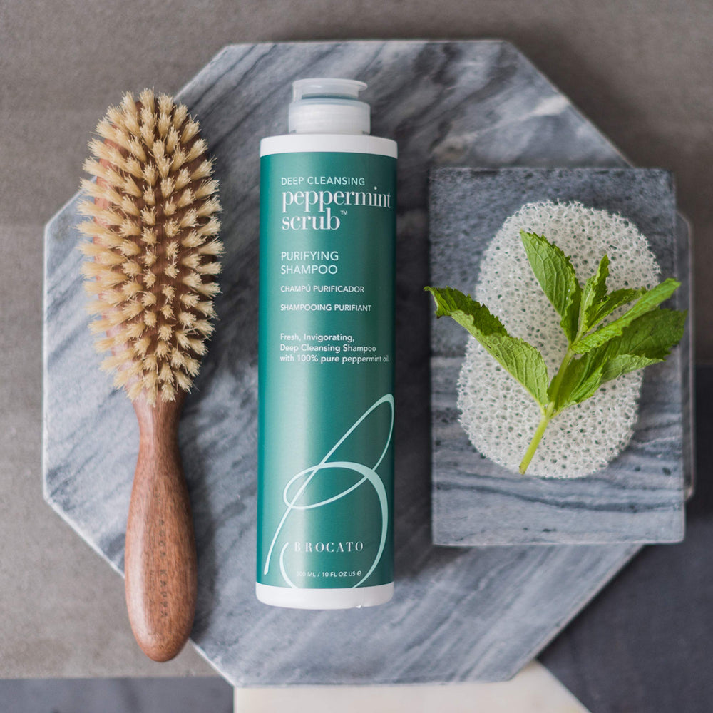 Brocato Peppermint Scrub Purifying Shampoo texture shows creamy lather and rinse