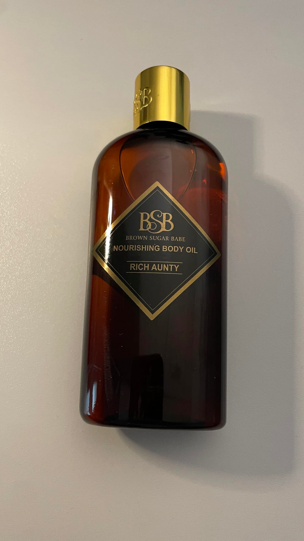 Brown Sugar Babe Rich Aunty Oil USA-made label shows craftsmanship.