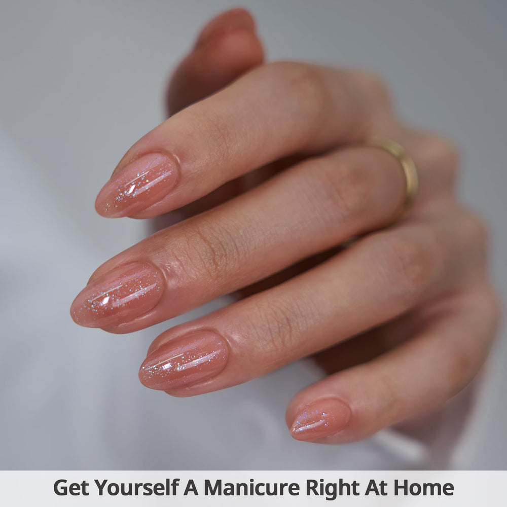 BTArtbox Citrine Glow nails on finger demonstrate natural almond shape for everyday elegance.