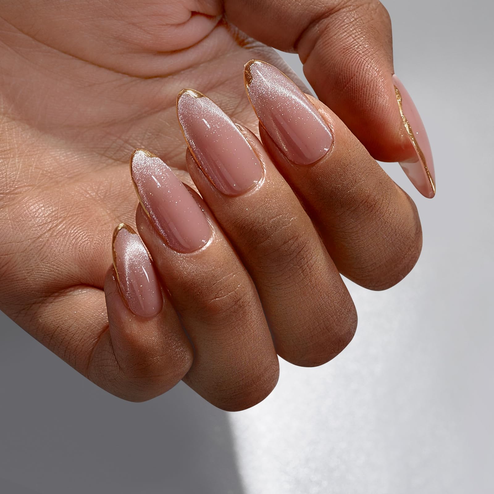 BTArtbox Knightshield cat-eye almond nails show glossy finish and secure fit.