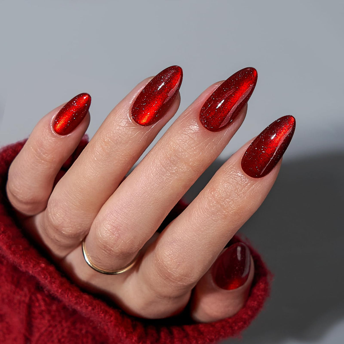 BTArtbox almond nails with deep red sparkly finish offer a chic salon-like look at home