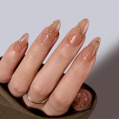 BTArtbox Radiant Ribbons almond nails with 3D gold lines for a luxe manicure vibe