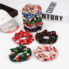 Budsmile Santa-pattern scrunchie for festive holiday hairstyles and party-ready looks
