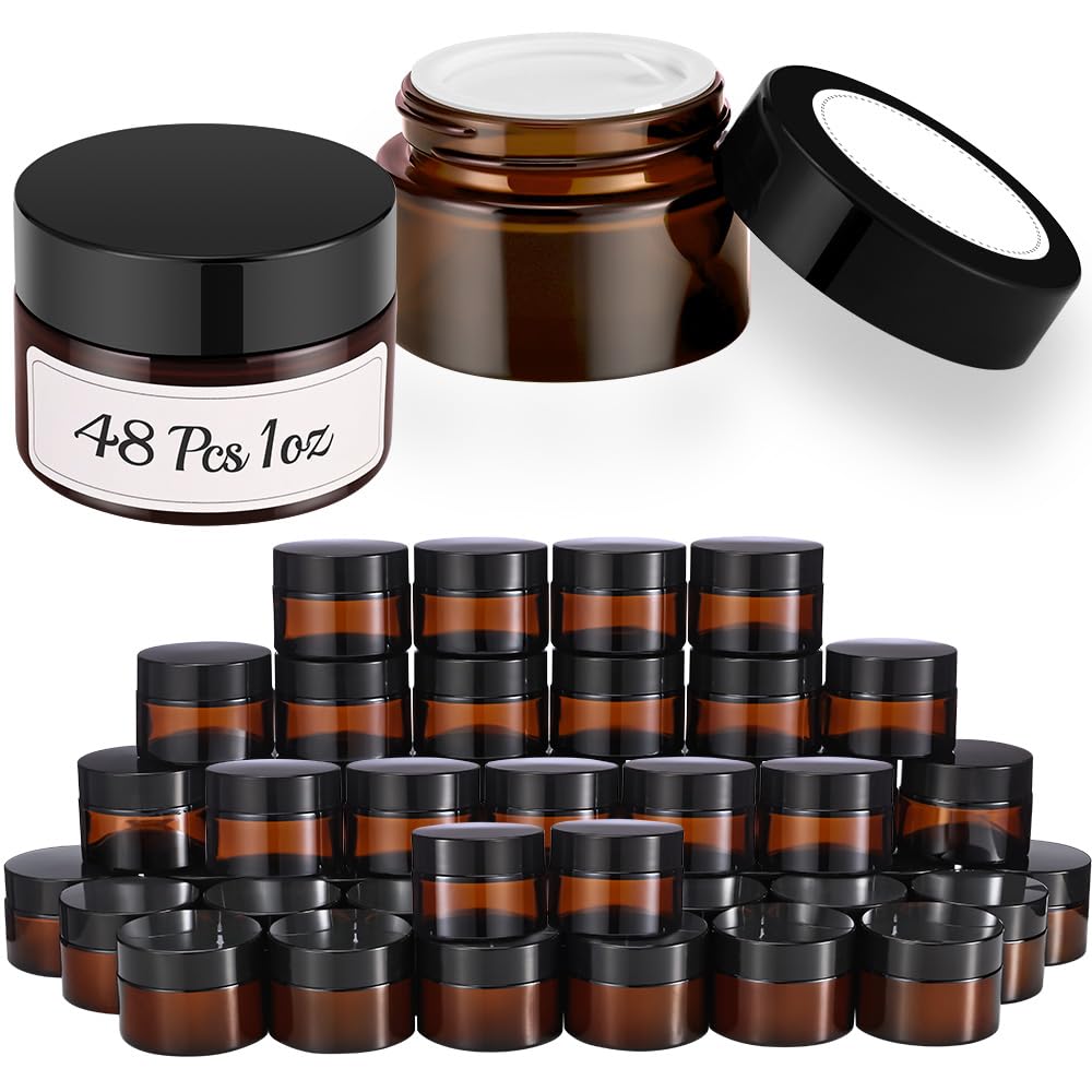 Bumobum 1oz amber glass jar with black lid for travel-friendly storage.