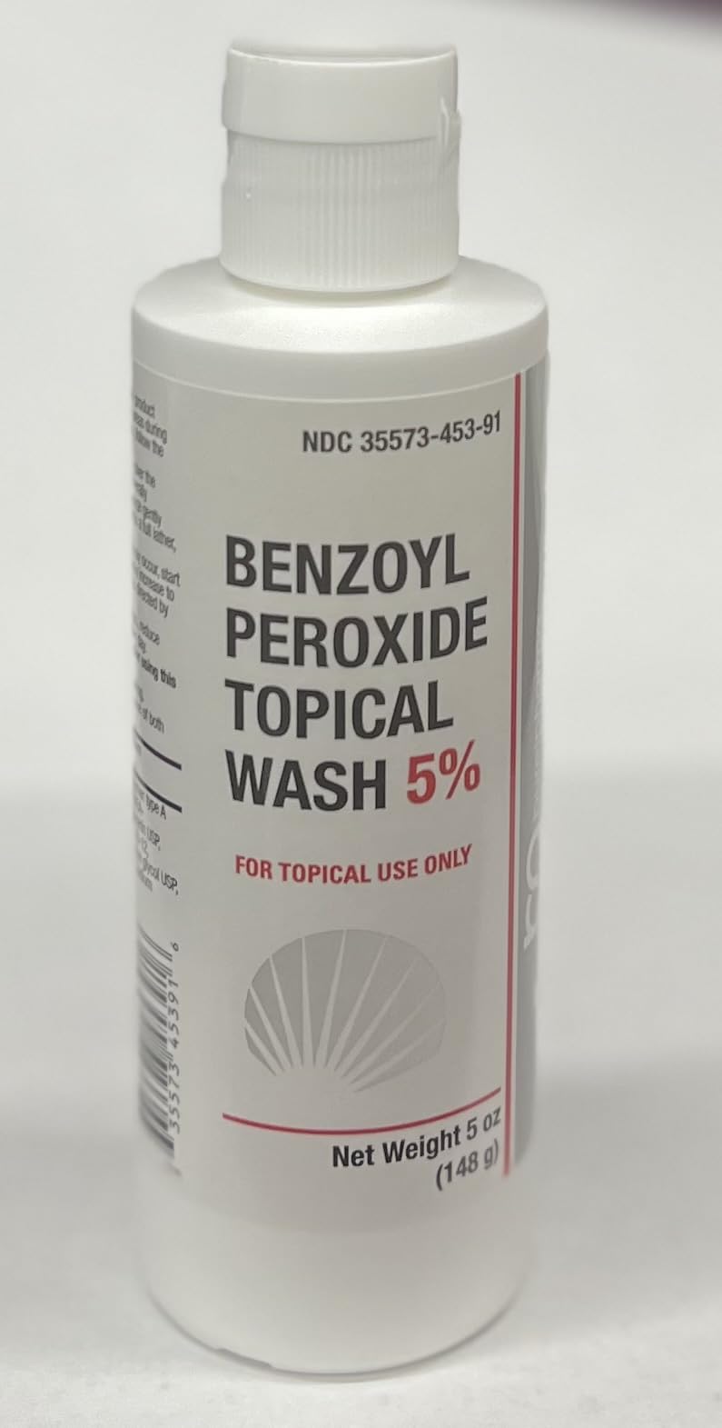 Burelpharma benzoyl peroxide face wash bottle label shows 5% formula for acne care.