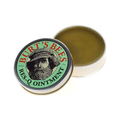 Burt's Bees tin front view showing compact salve for easy on-the-go soothing